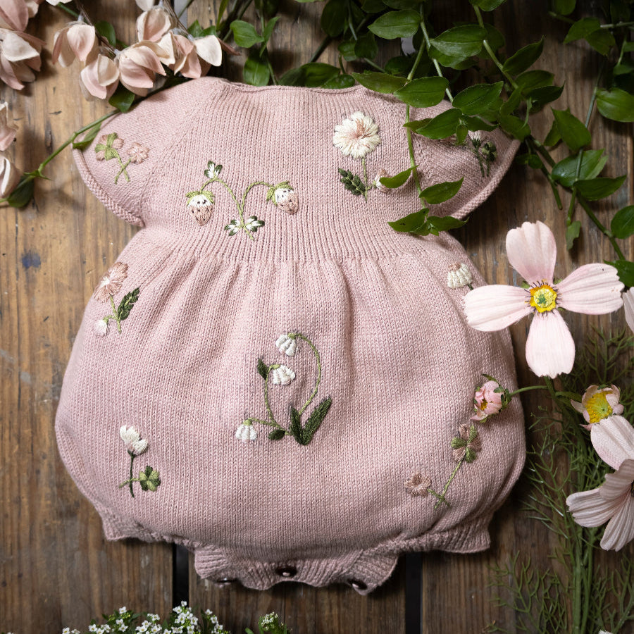 dahlia knitted botanical romper for babies