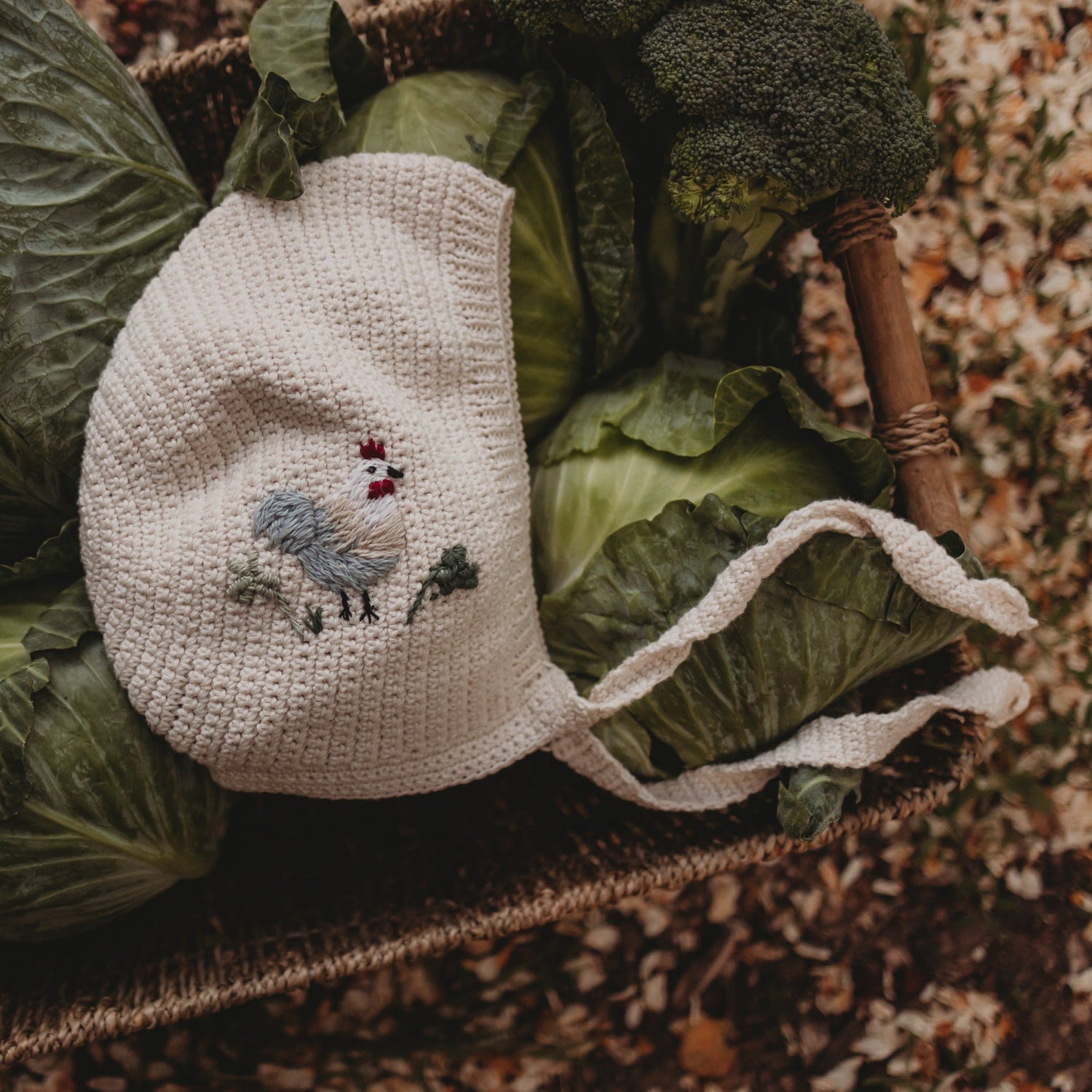 Chicken Bonnet - Marshmellow in a basket with vegetables.