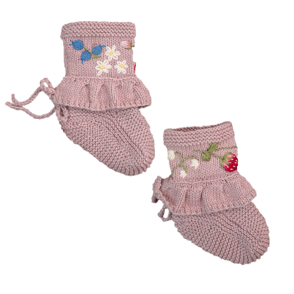 Pink knitted baby booties with ruffle trim and floral embroidery.