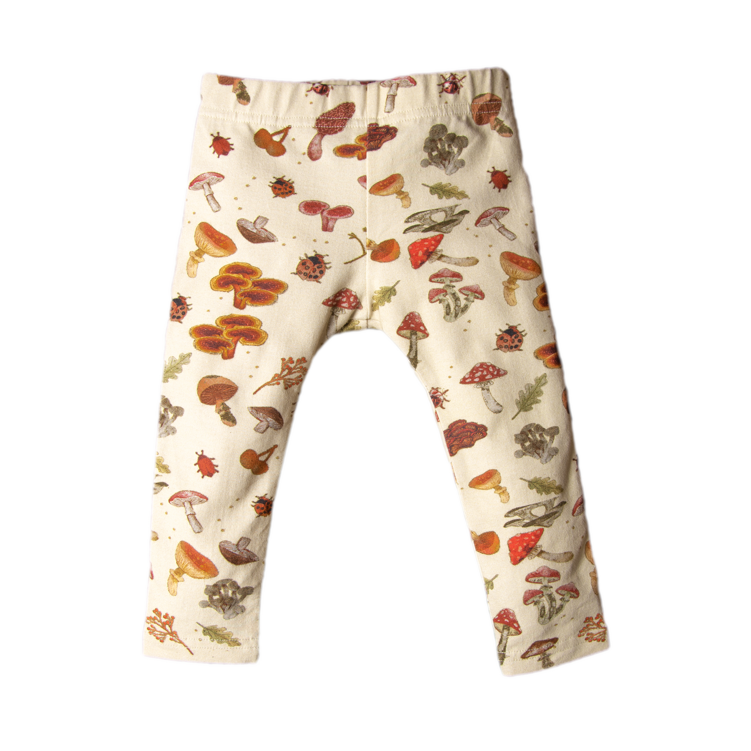 Cream-colored baby leggings with an all-over woodland mushroom print.
