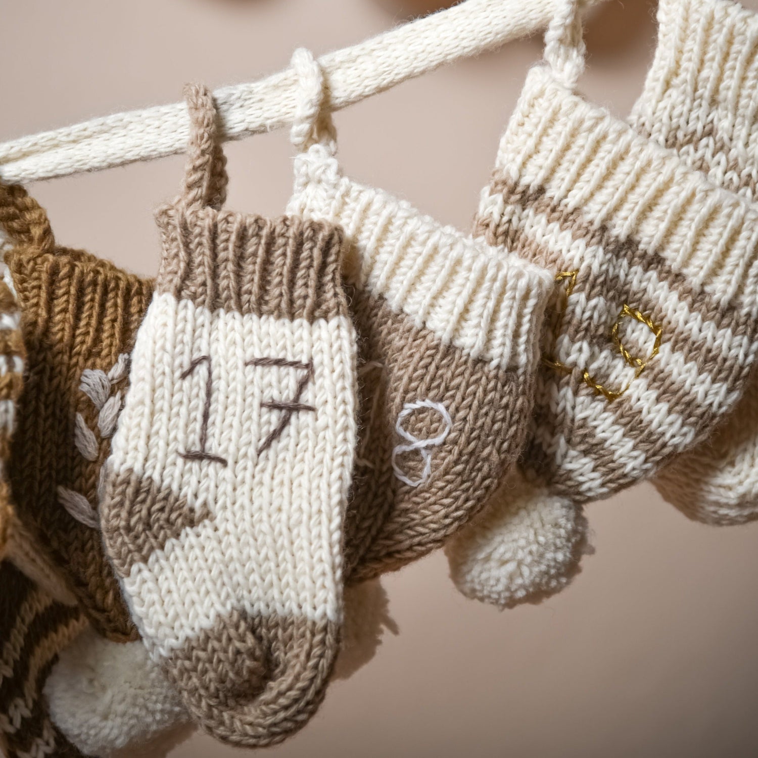 Close-up of a section of the cream wool Advent Calendar with the number 17 prominently displayed.