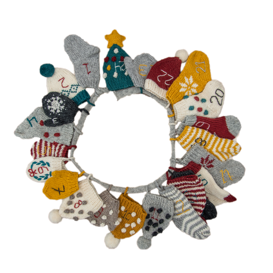 Handcrafted multicolor Advent Calendar with 24 unique mittens, hats, and socks.