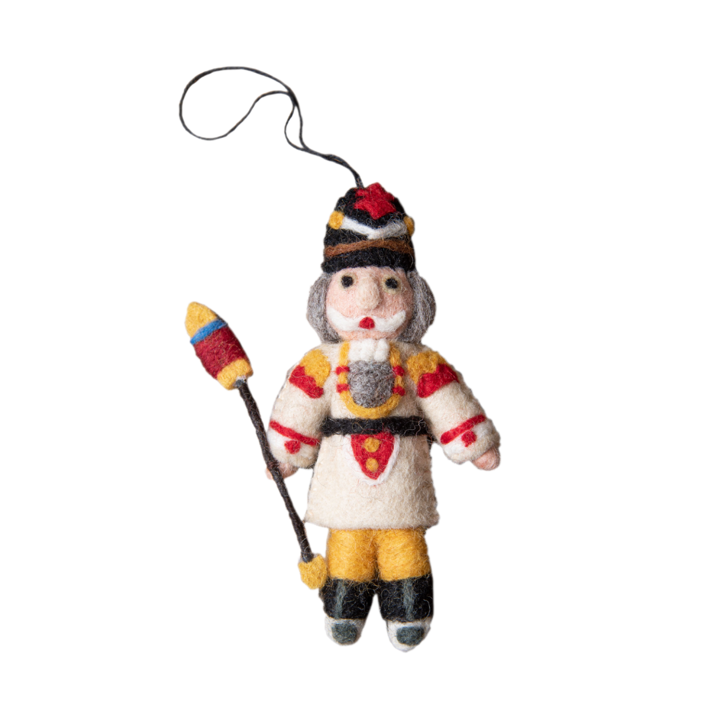 Nutcracker ornament in cream with intricate embroidery and whimsical details