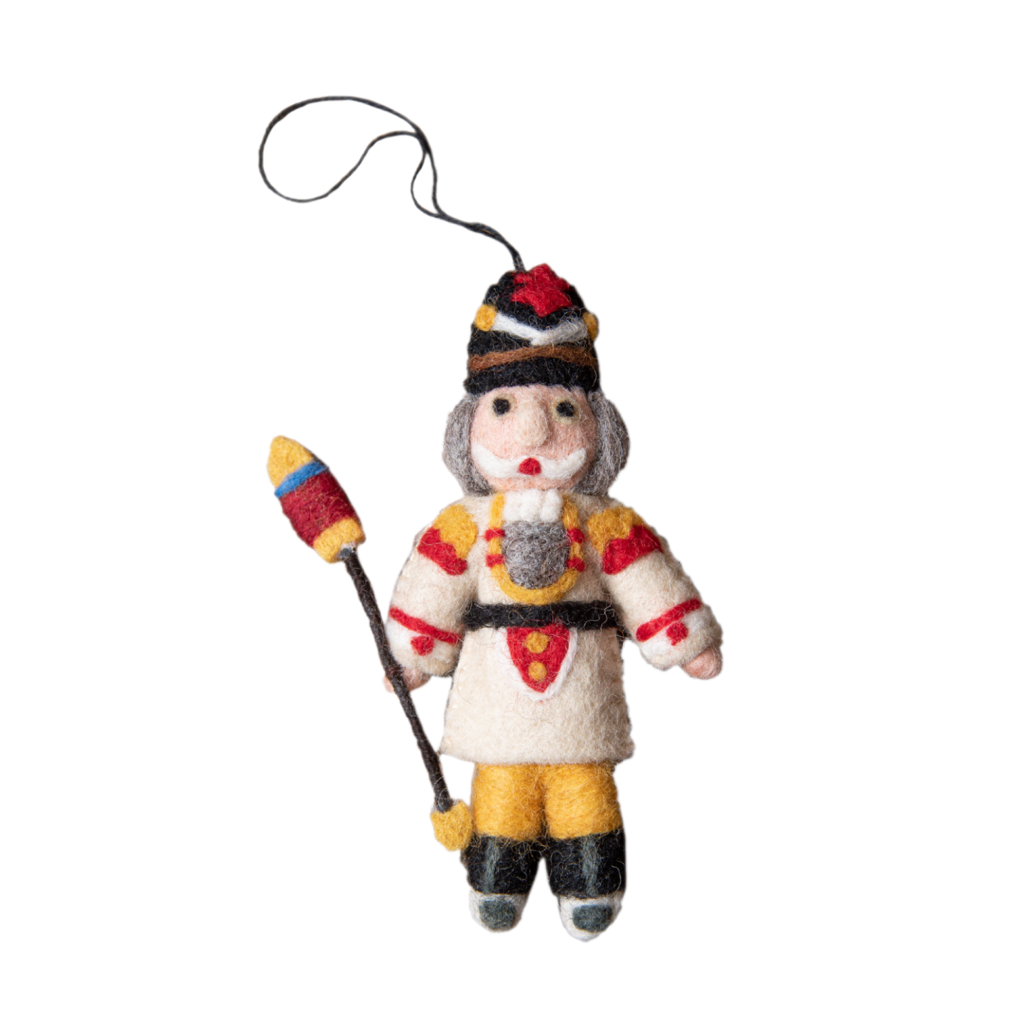 Nutcracker ornament in cream with intricate embroidery and whimsical details