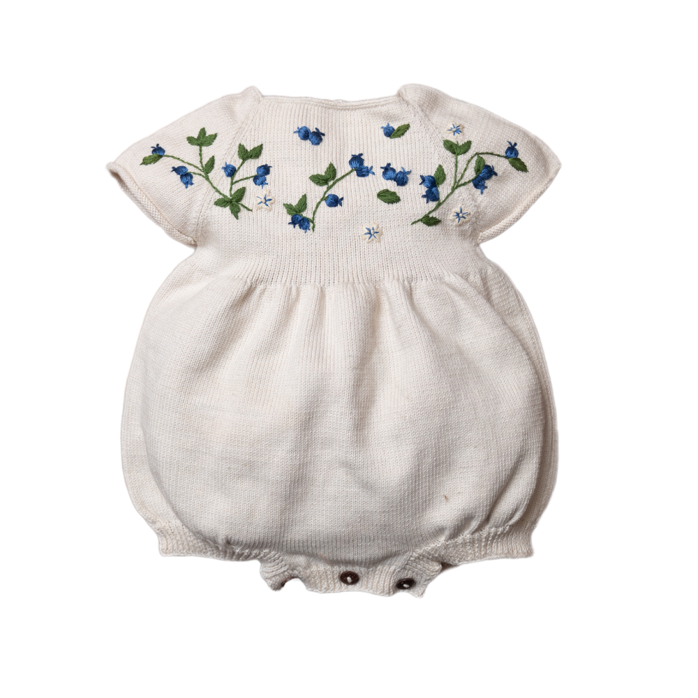 knitted and hand embroidered blueberries romper in Marshmallow
