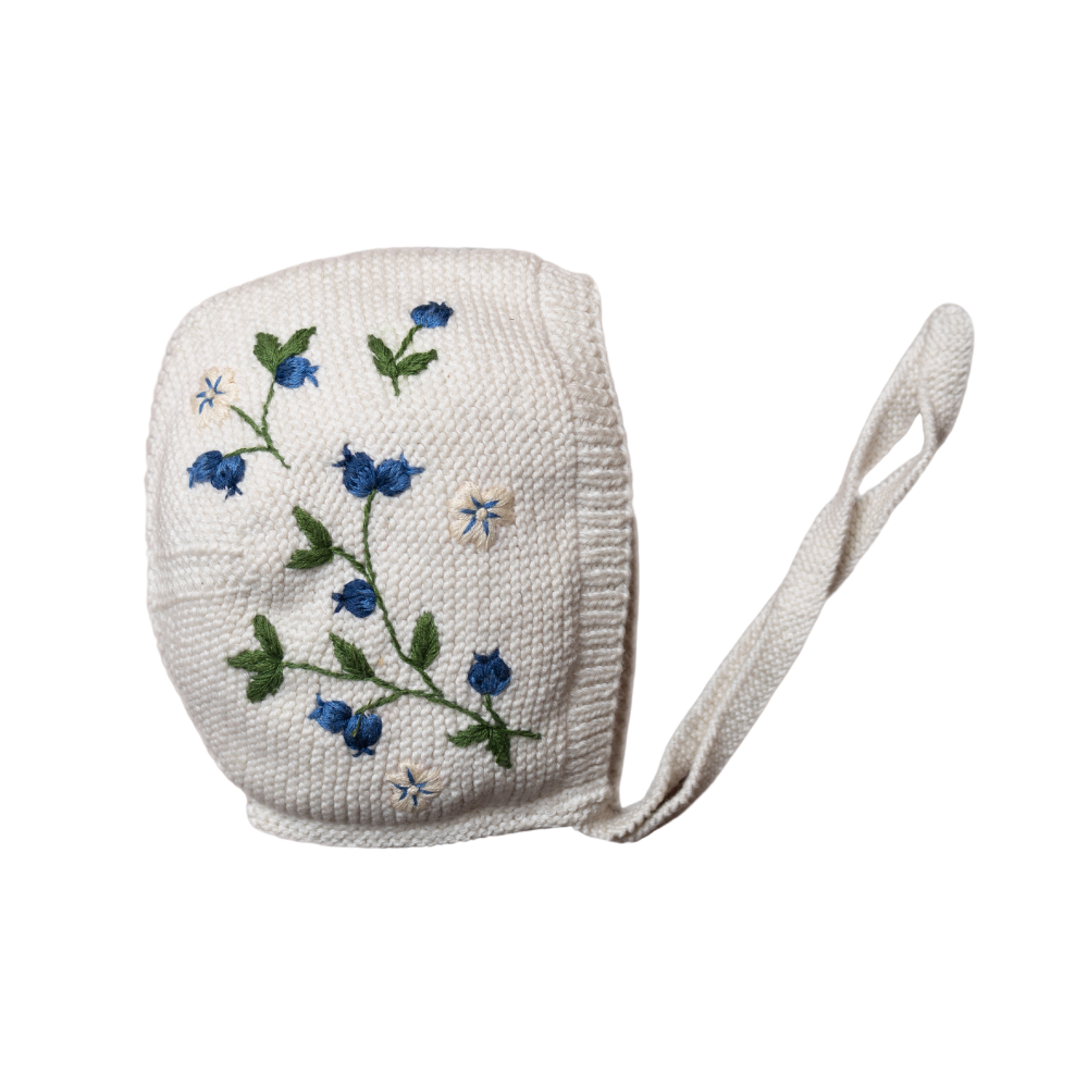 knitted and hand embroidered blueberries bonnet for baby in Marshmallow
