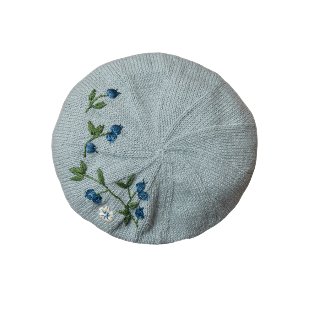 knitted and hand embroidered blueberries beret in Duck blue
