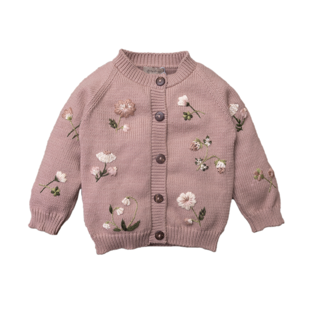 Hand-knitted cotton cardigan in a soft dahlia shade, adorned with cream and green floral embroidery.