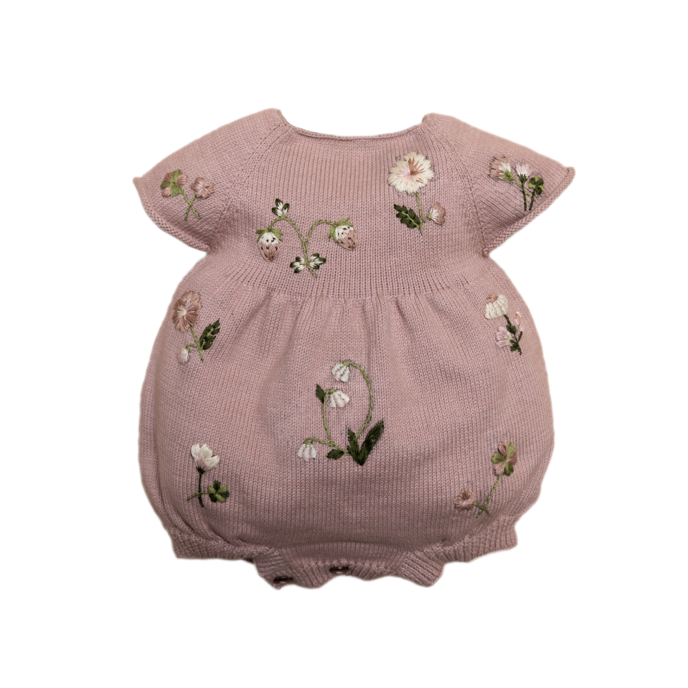 knitted and hand embroidered botanical romper